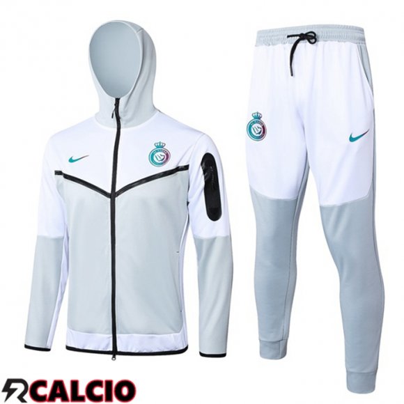 Tuta Calcio - Giacca A Vento Al-Nassr FC Bianco 2024/2025  Tuta Calcio - Giacca A Vento Al-Nassr FC Bianco 2024/2025