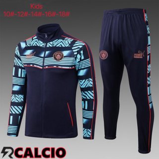 Insieme Tuta Calcio - Giacca Manchester City Bambino Nero Blu 2023/2024  Insieme Tuta Calcio - Giacca Manchester City Bambino Nero Blu 2023/2024